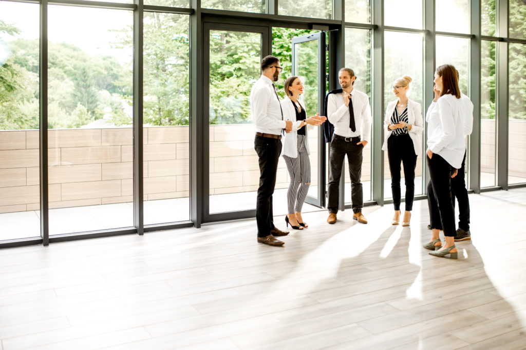 Team of property managers collaborating inside an upscale home